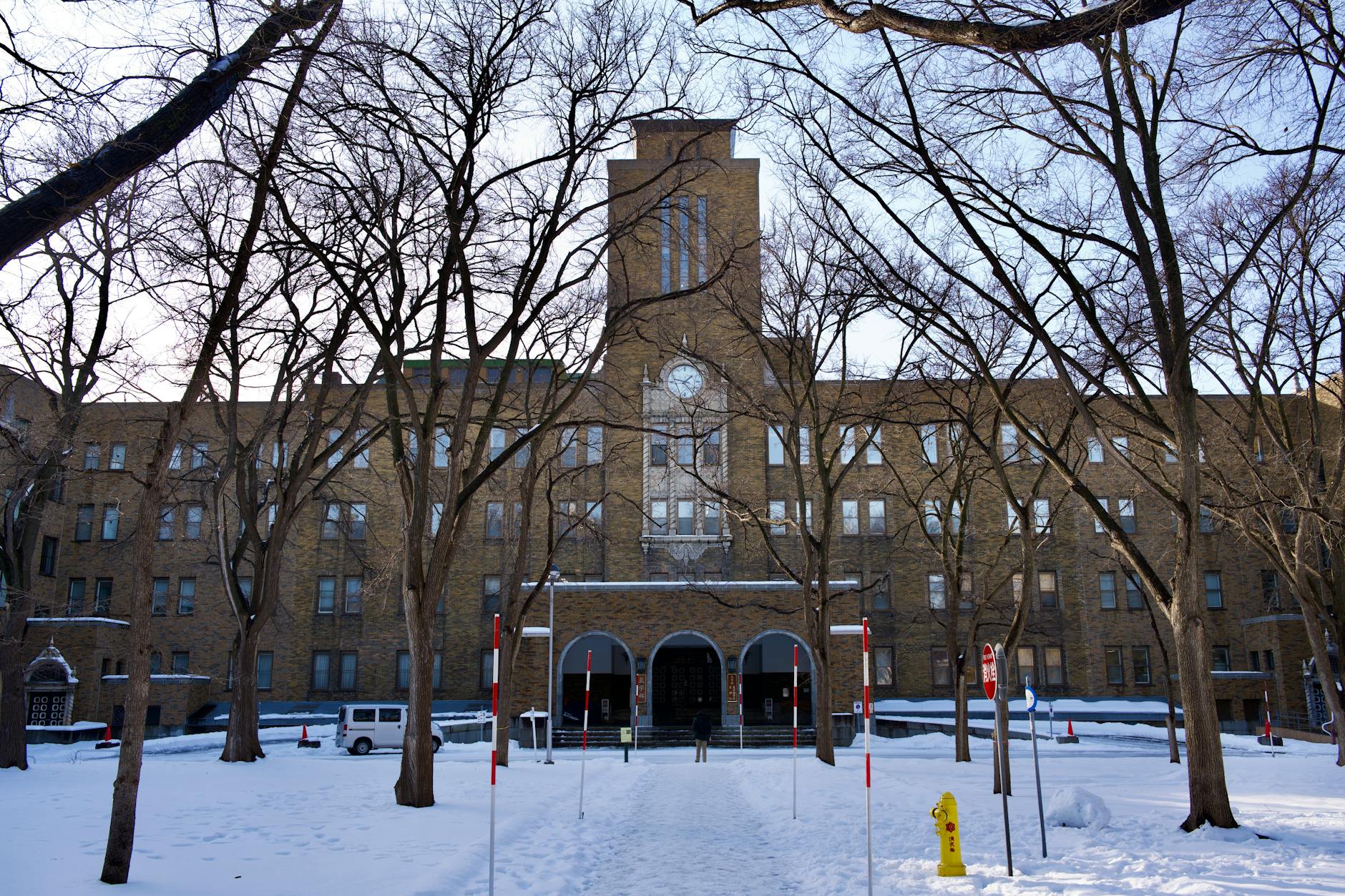 historic brick building in snowy winter scene